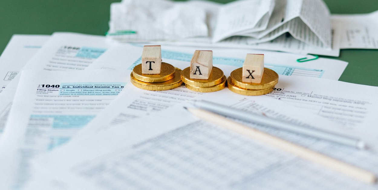 Jak legalnie obniżyć podatki w firmie i nie narazić się na problemy z urzędem?